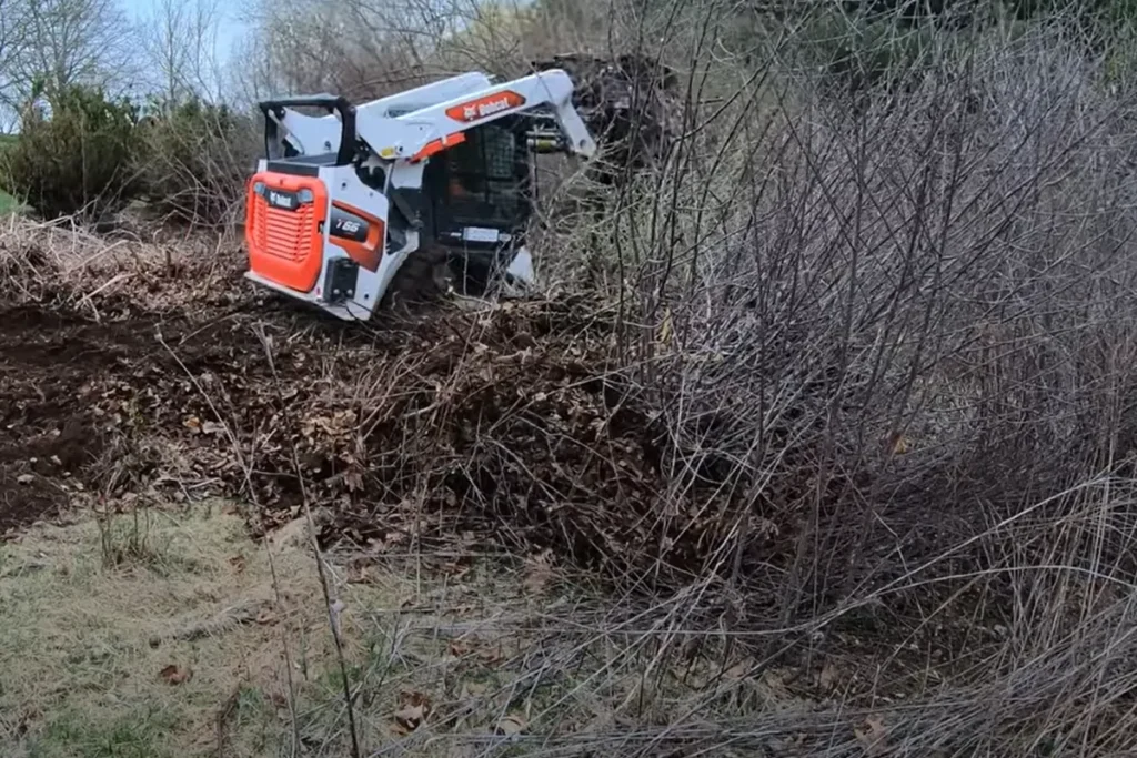 A professional team performing Brush Clearance and Fire Abatement Services around a residential property in Rim Forest, CA, showcasing effective wildfire risk reduction and enhanced home safety.